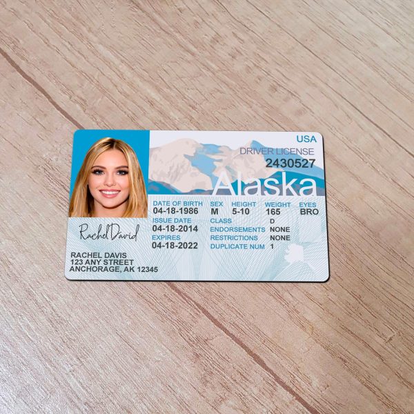 An editable template of a Alaska driver license, featuring a realistic design for customization, including fields for personal information, photo, and signature.