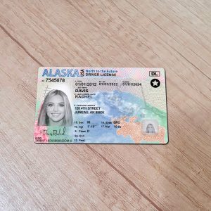 An editable template of a Alaska driver license, featuring a realistic design for customization, including fields for personal information, photo, and signature.