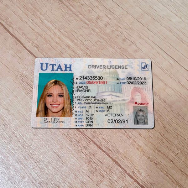 An editable template of a Utah driver license, featuring a realistic design for customization, including fields for personal information, photo, and signature.